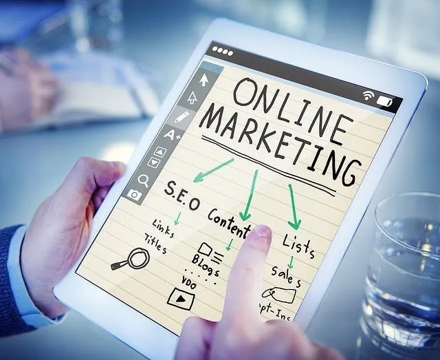 Tablet with online marketing graphic showing SEO, content, and lists